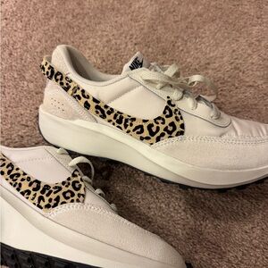 Nike Women's White Sneakers with Leopard Swoosh Accent